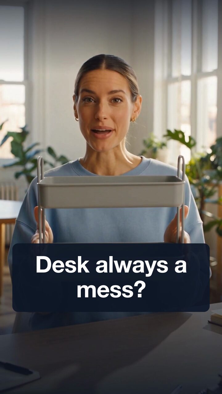 Video cover: an AI-generated presenter holds up a foldable desk organizer rack, with the caption “Desk always a mess?”